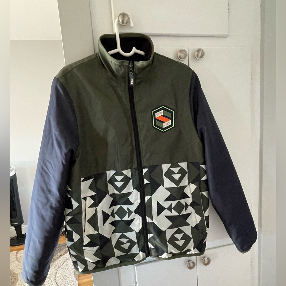 Reversable Scott & Soda men’s jacket in green, blue and white geometric print.